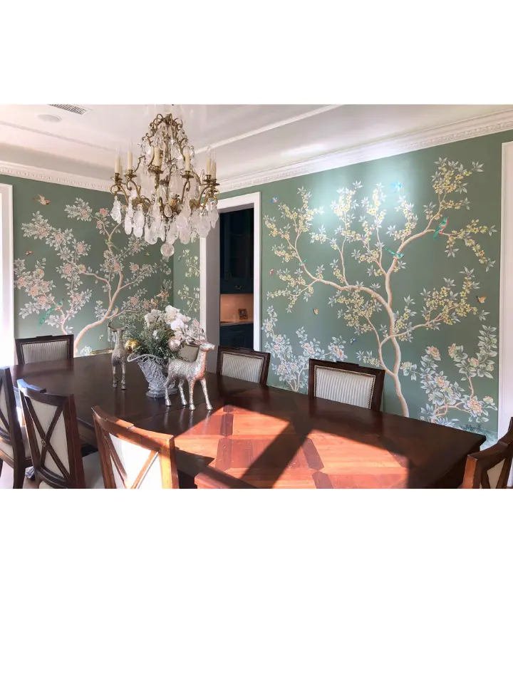 Elegant dining room with floral mural wallpaper, crystal chandelier, and dark wood dining table.